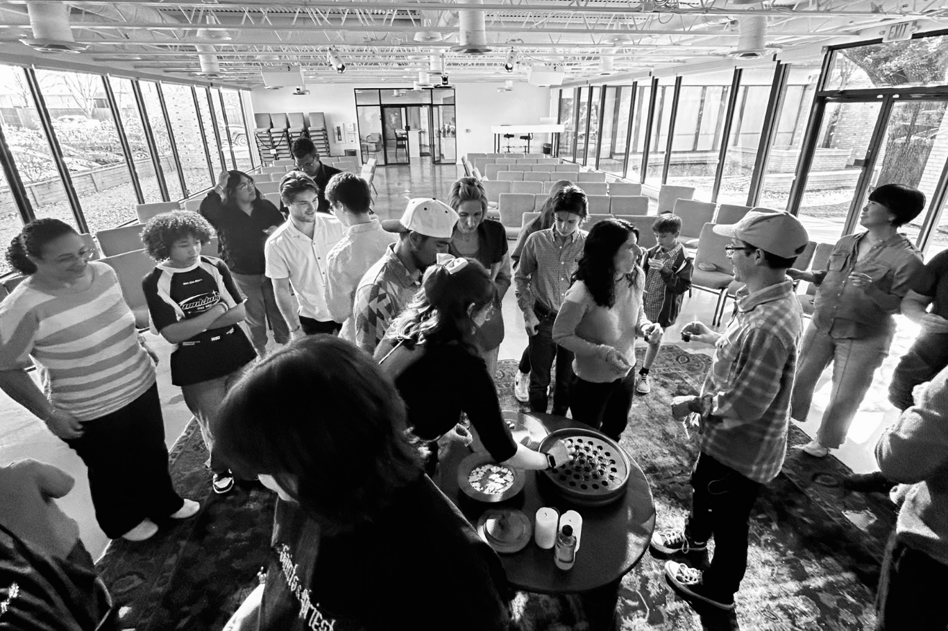 Gathering of believers celebrating communion together at Wellspring